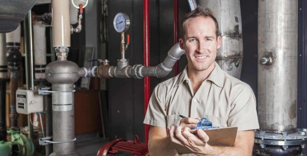 Smiling Plumber Getting a Quote